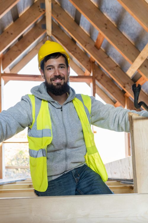 front-view-carpenter-man-sitting-smiling